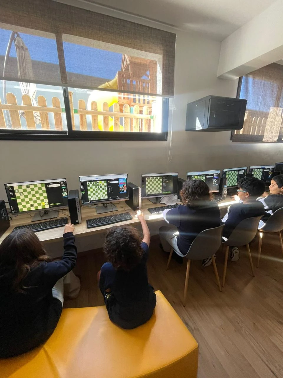 Students using chess as part of digital learning enrichment at SBG Academy