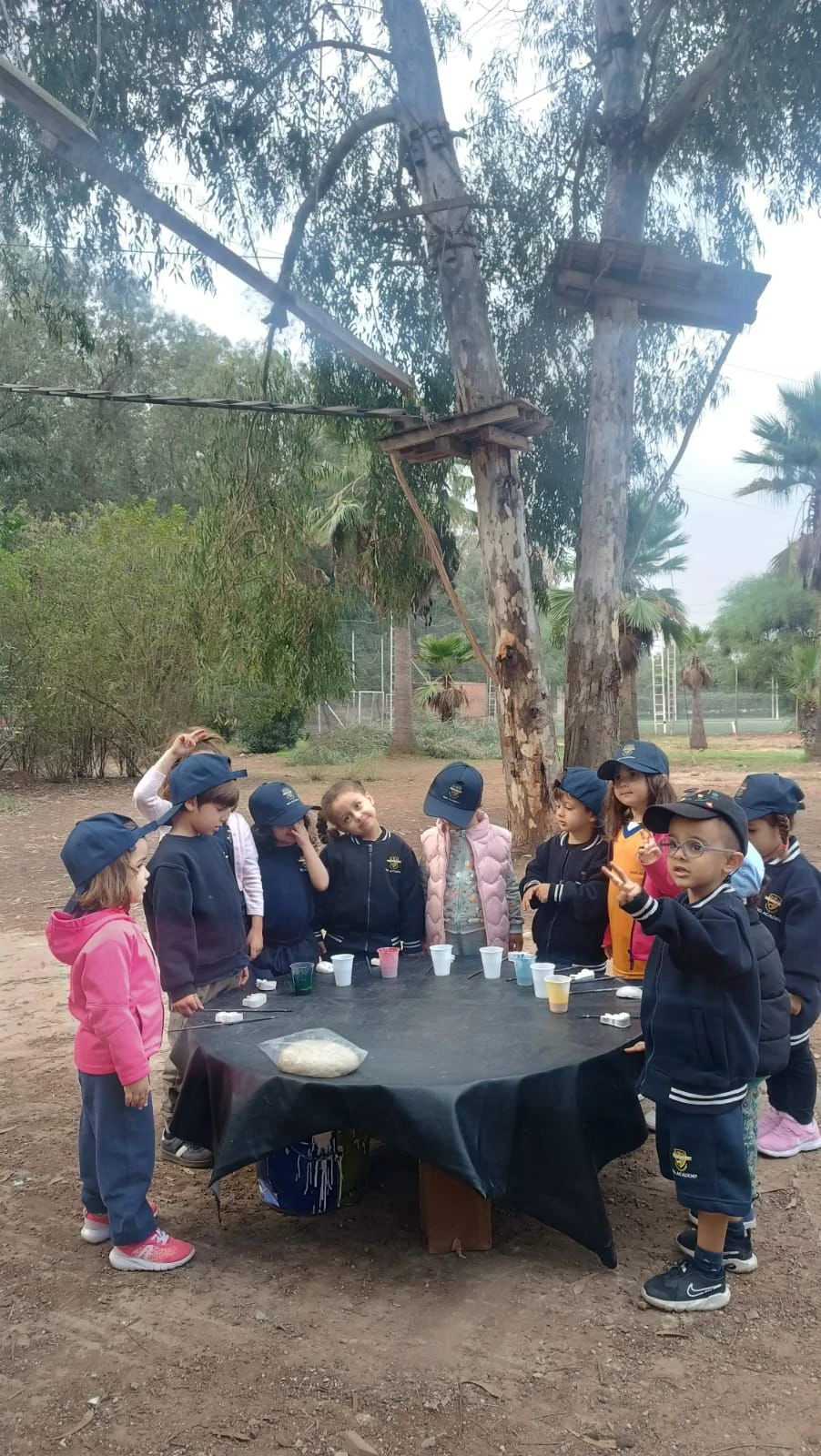 Early Years students learning outdoors at SBG Academy